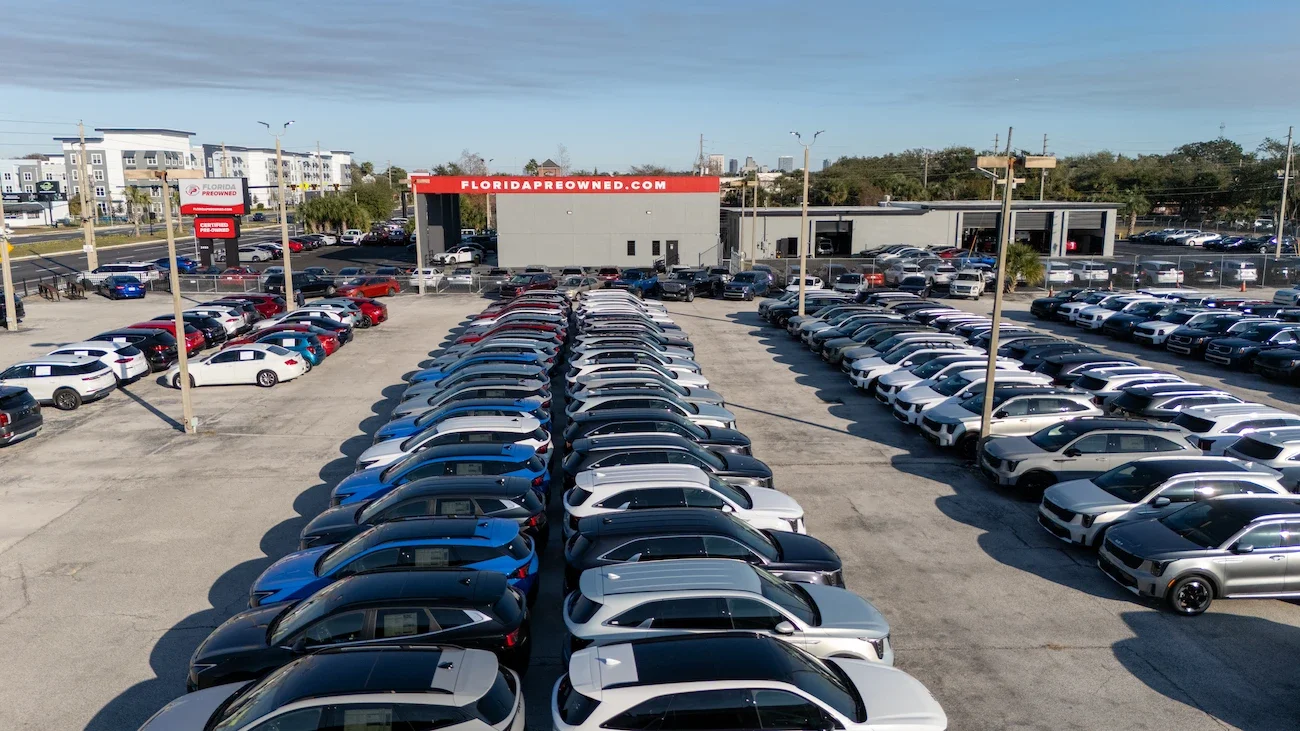 Cars with a 3rd row including a minivan and a 3-row SUV at Florida Preowned on West Colonial Drive in Orlando