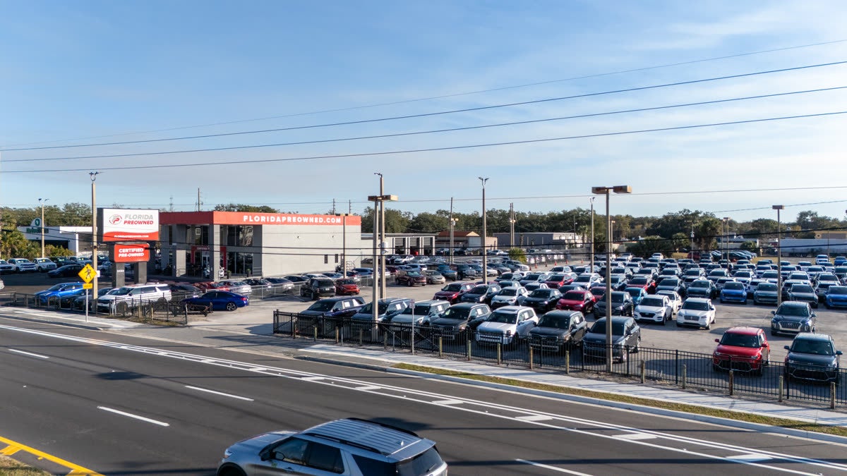 Florida Preowned lot at 3450 W Colonial Drive, Orlando, FL 32808 — dozens of pre-owned sedans, SUVs, and family vehicles available to compare, just 25 to 35 minutes north of Kissimmee.